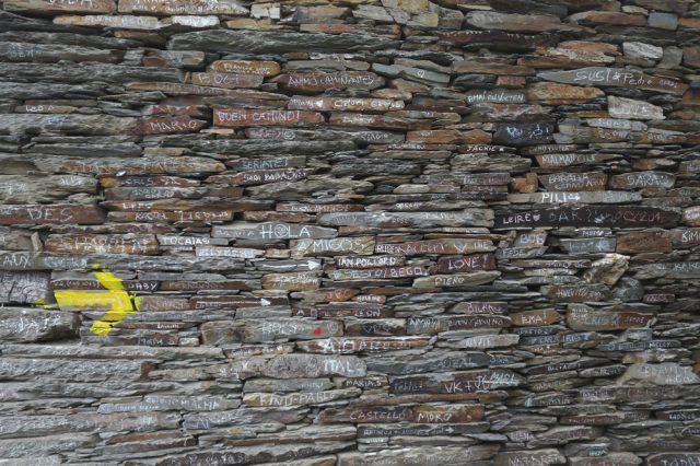 arrow on a brick wall